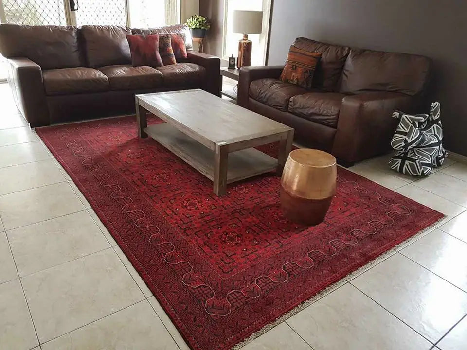 Red hand knotted carpet in a home
